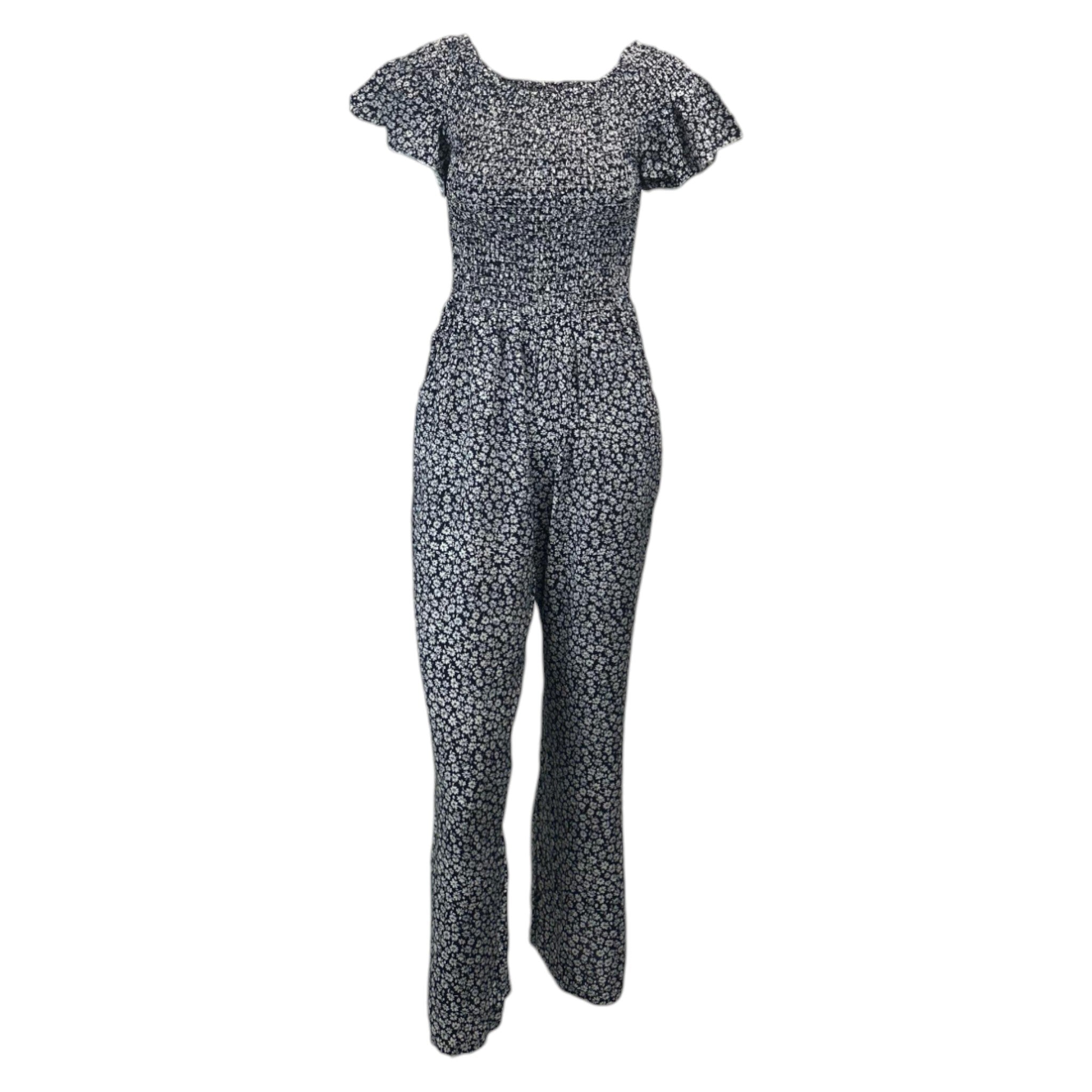 Navy floral women's jumpsuit with short sleeves and cropped legs โ lightweight summer outfit